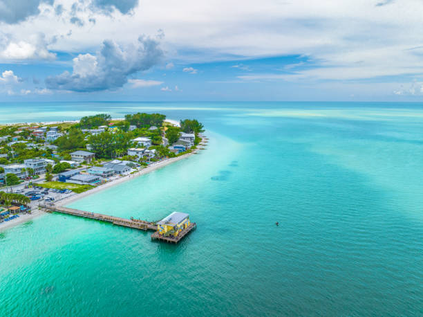 Aerial view of the Bradenton Beach pier and clear turquoise Gulf water