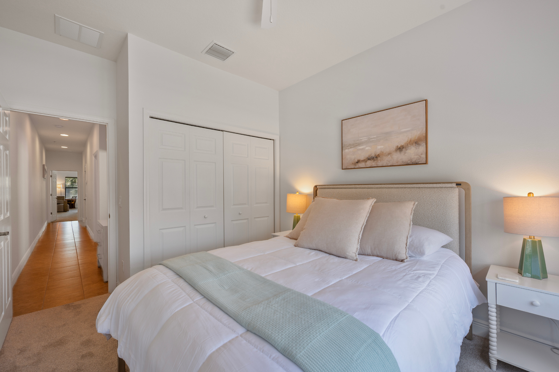 Third bedroom with closet storage and hallway access