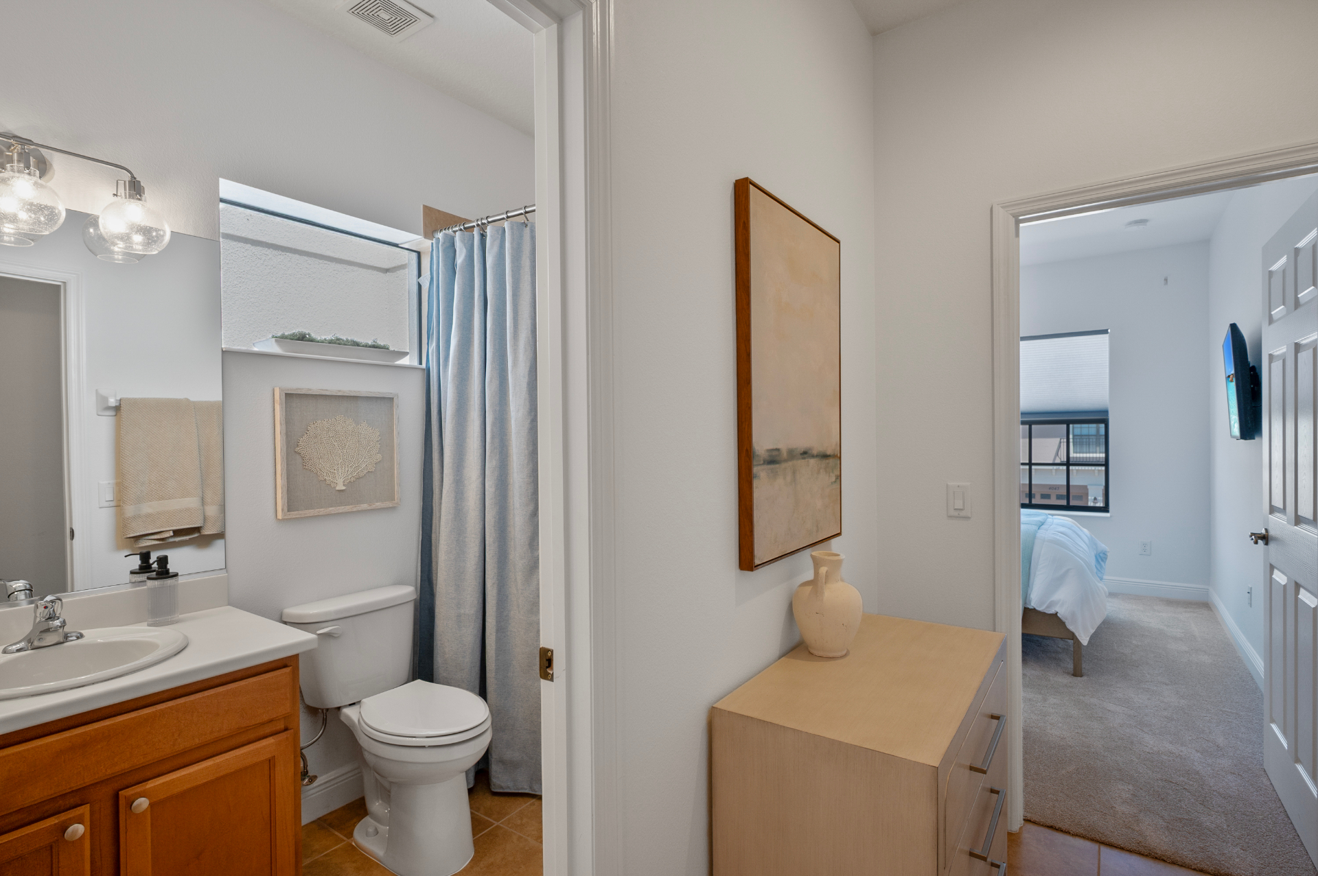 Bathroom opening off the upper hallway near the bedrooms