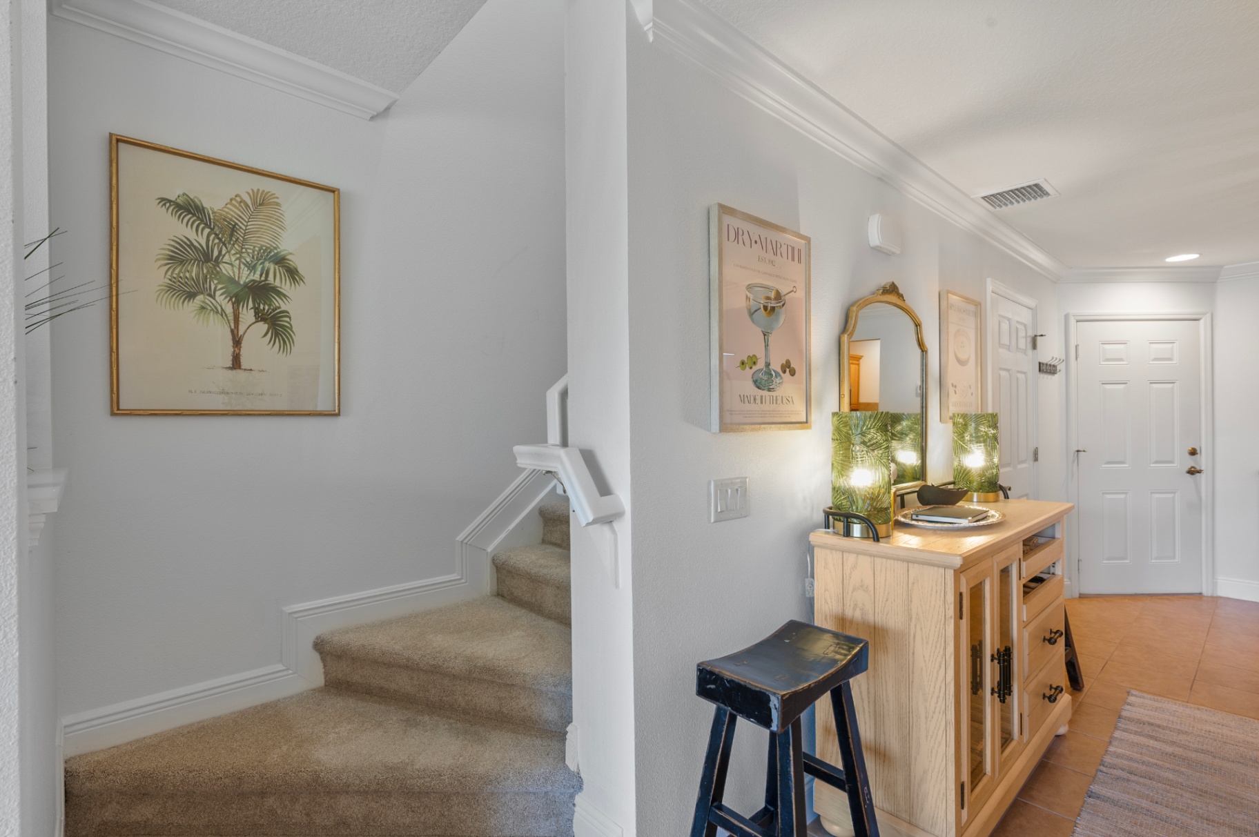 Stair and entry hall inside the Bradenton townhome